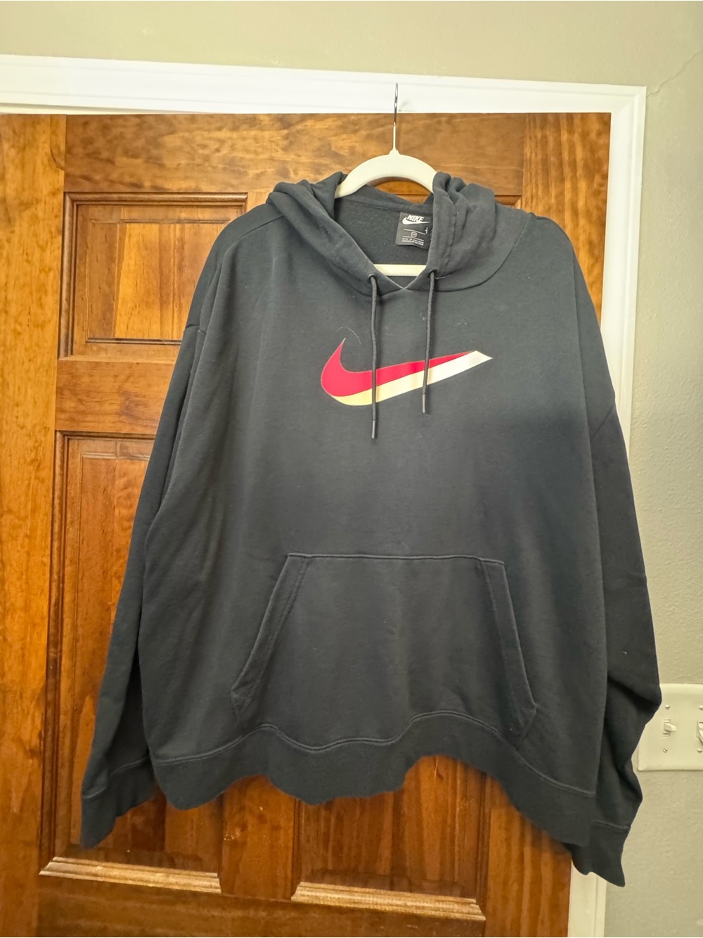 Nike Black Pullover Hoodie with Red and White Swoosh